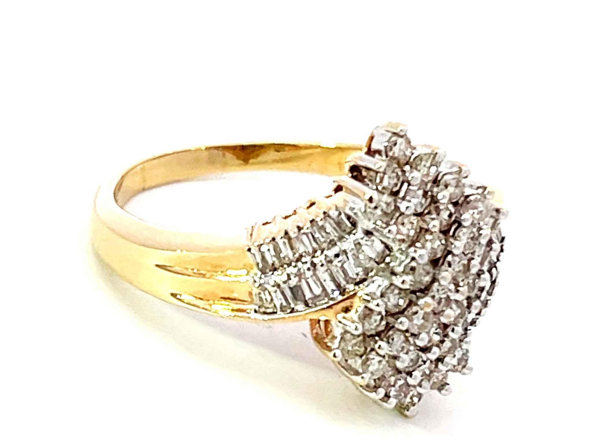 Baguette and Brilliant Cut Diamond Twist Ring in 14K Yellow Gold