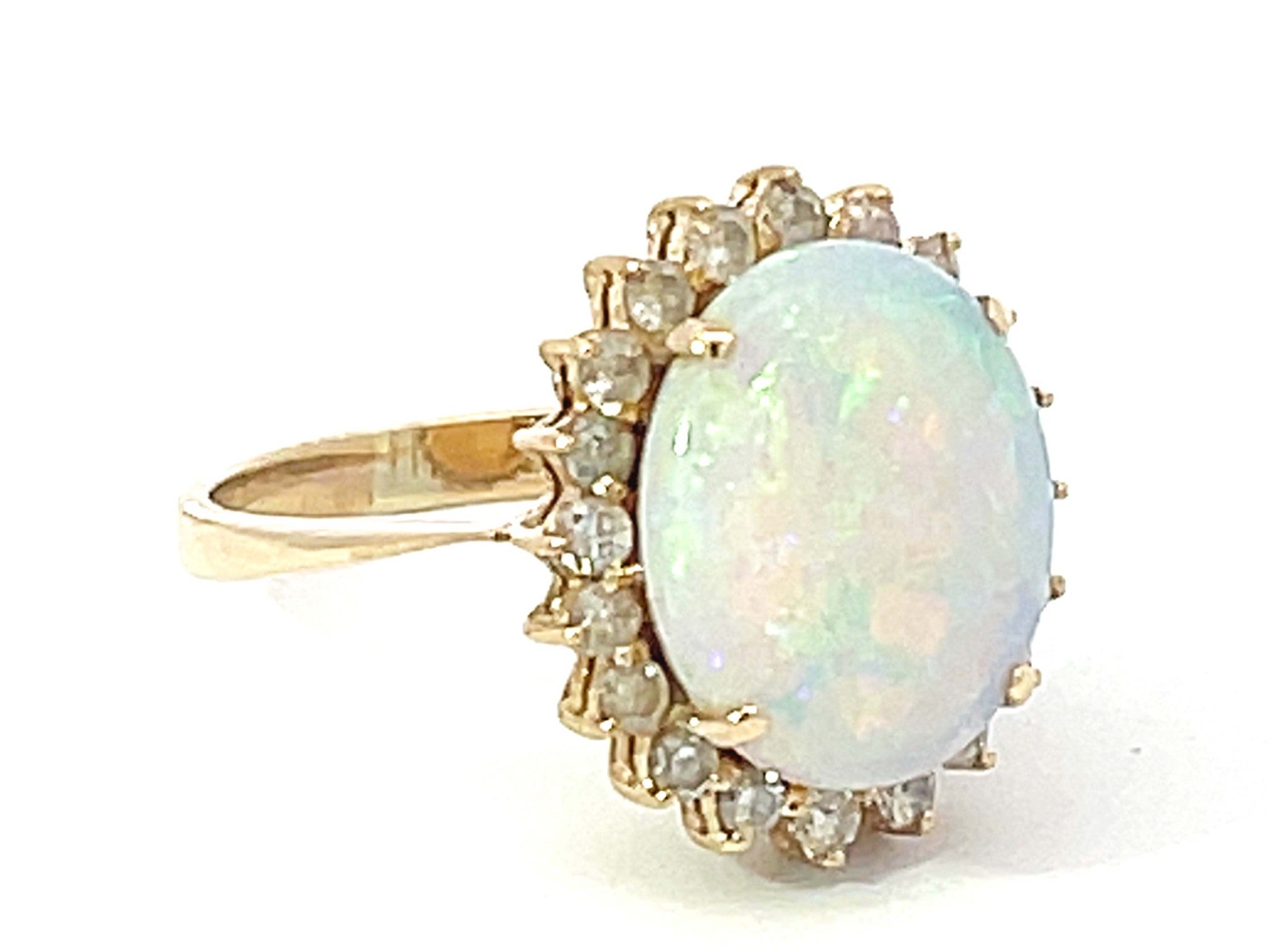 Opal and Diamond Halo Ring in 14k Yellow Gold